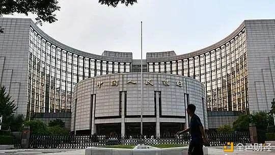 资料图:市民从中国人民银行前经过。中新社记者 张兴龙 摄 央行数字货币